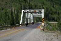 Most of the bridges along the Alaska Highway are surfaced ith steel grate for drainage.