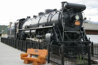 An old steam locomotive on display at the Jasper rail station